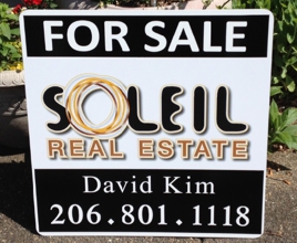 Real estate A-board sign.